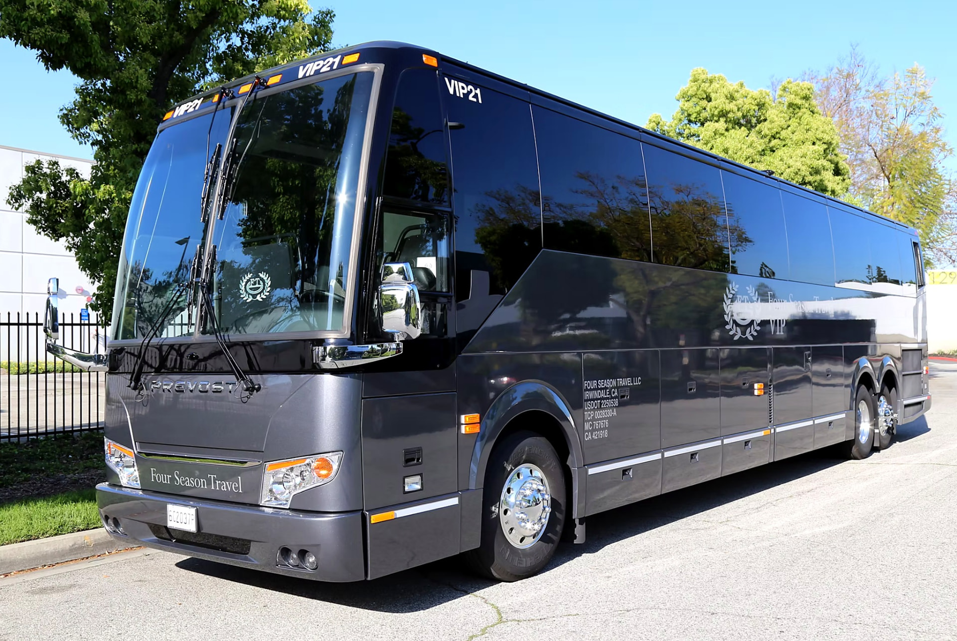 Four Season Travel VIP coach exterior, front three-quarter view of the Prevost H3-45