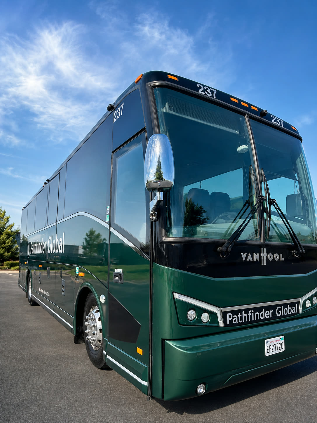 Four Season Travel Mini Coach exterior showing the full side and front of the coach
