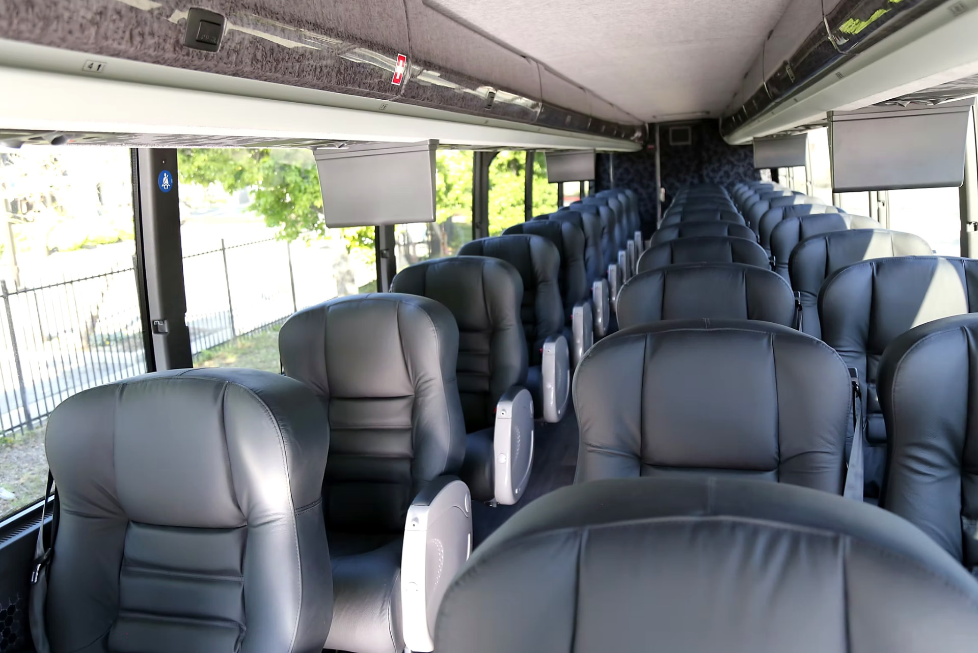 Four Season Travel VIP coach cabin viewed from the front rows toward the rear