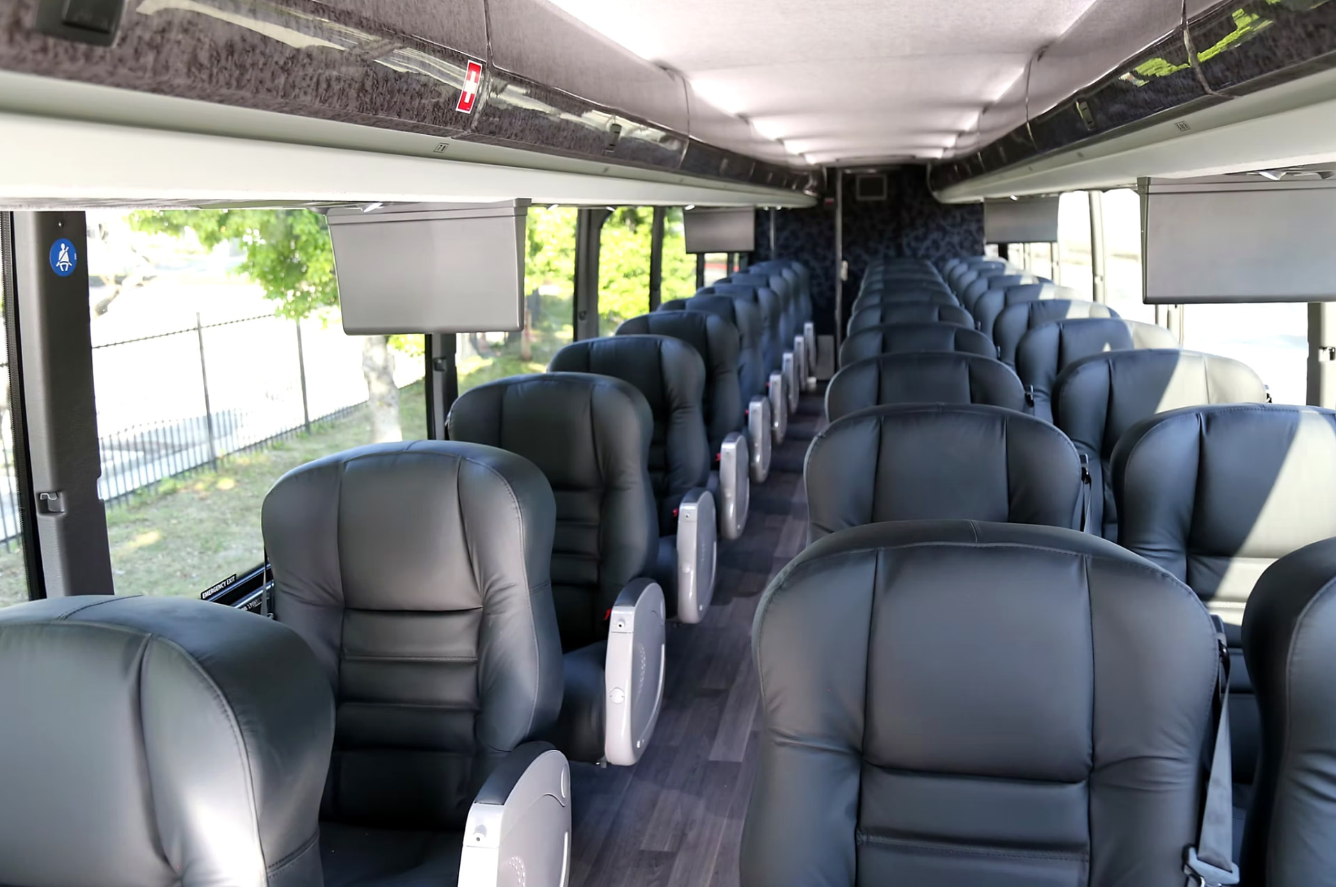 Alternate wide interior view of the Four Season Travel VIP coach cabin