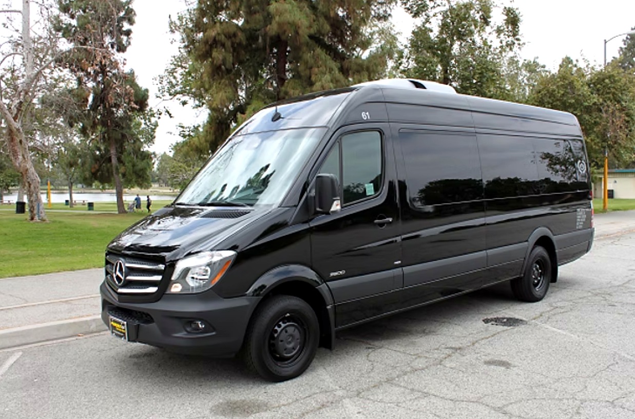 Black Four Season Travel Mercedes-Benz Sprinter executive van, side exterior view