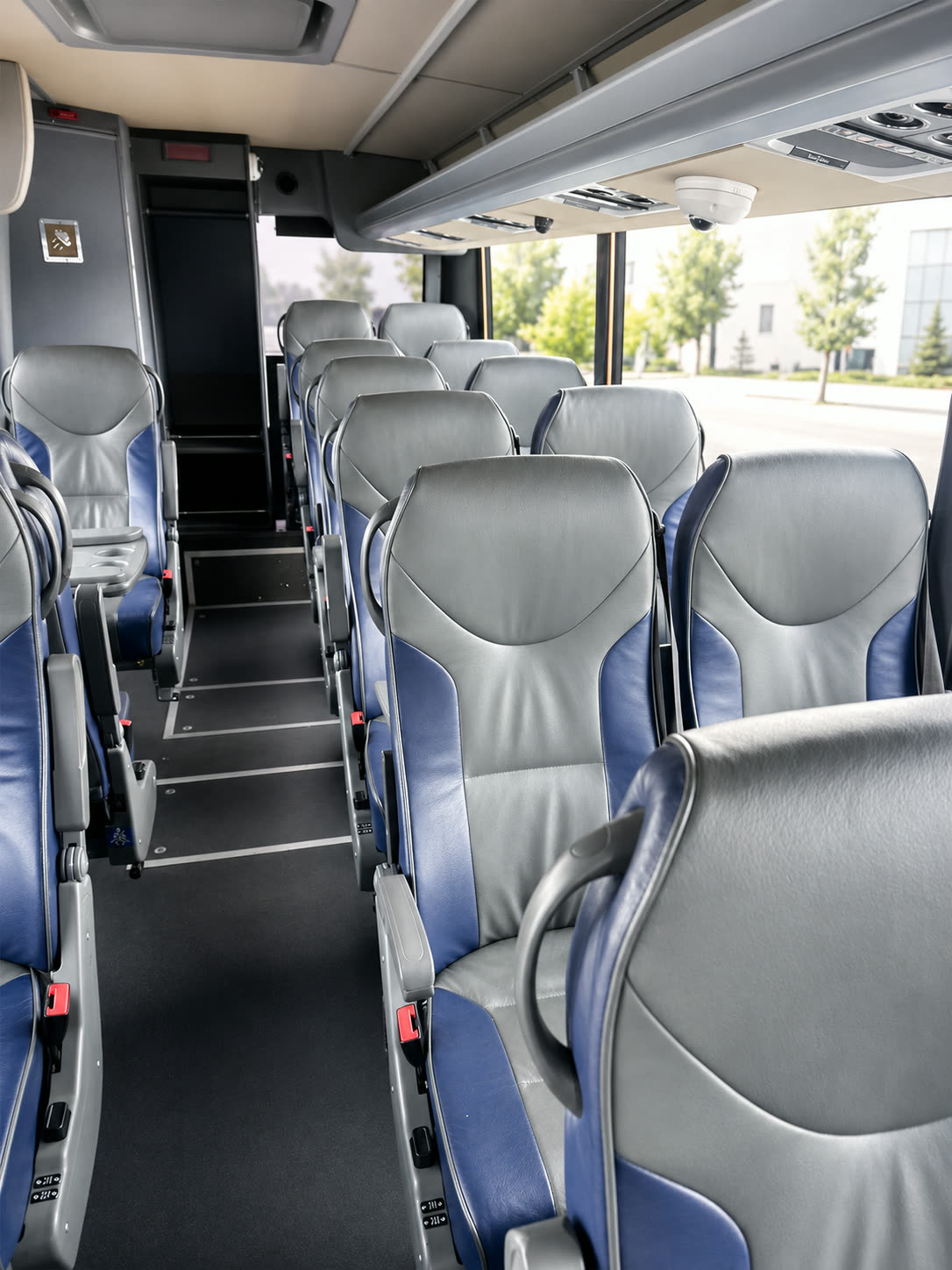 Four Season Travel Mini Coach passenger seating with leather reclining seats