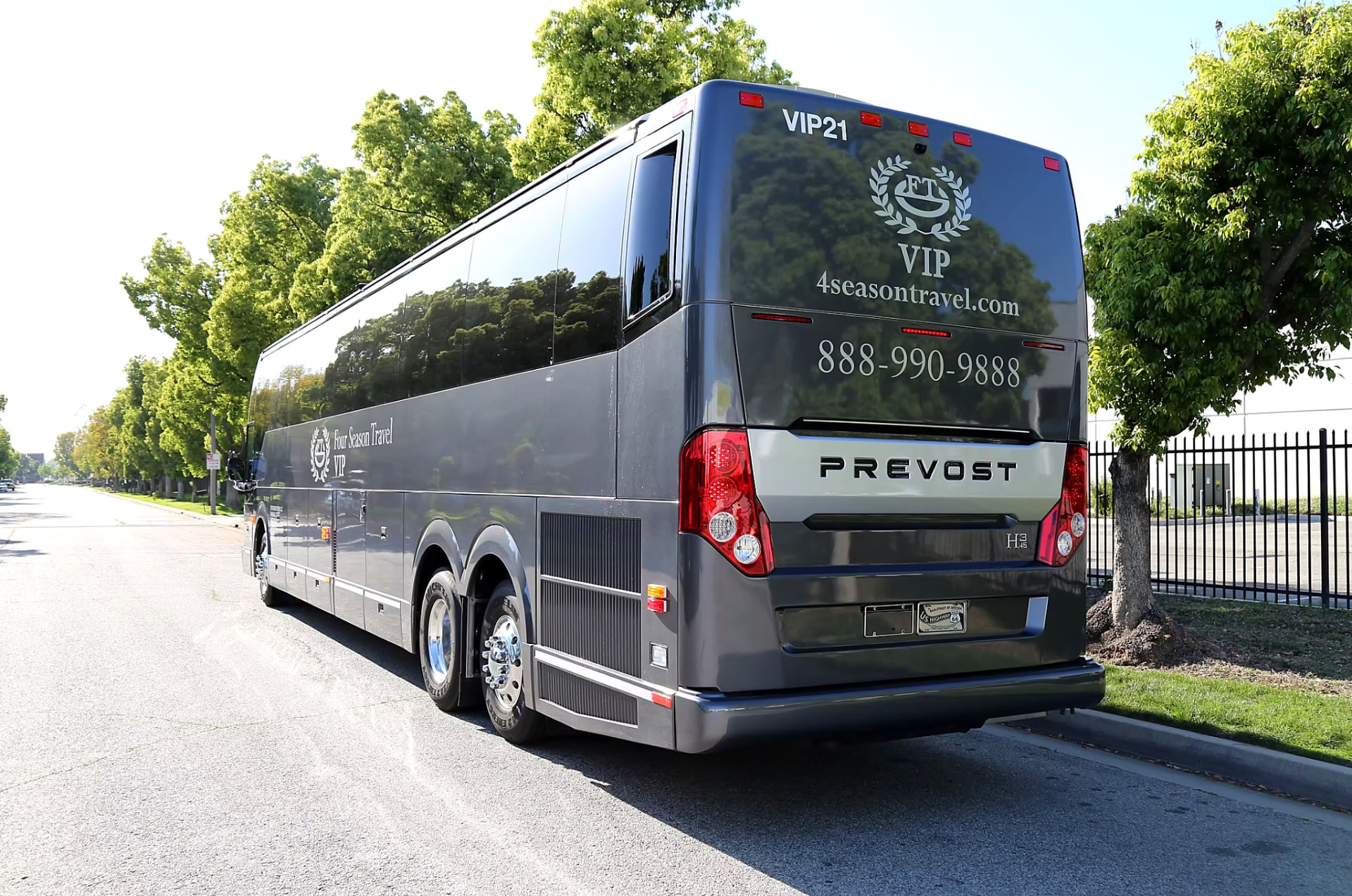 Rear three-quarter view of the Four Season Travel VIP coach